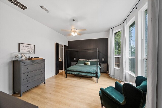 15040 Berry Brook Dr, Conroe, TX 77302 - bedroom featuring light wood-type flooring, ceiling fan, and lofted ceiling