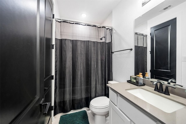 15040 Berry Brook Dr, Conroe, TX 77302 - full bathroom with vanity, toilet, a shower with curtain, and a textured wall