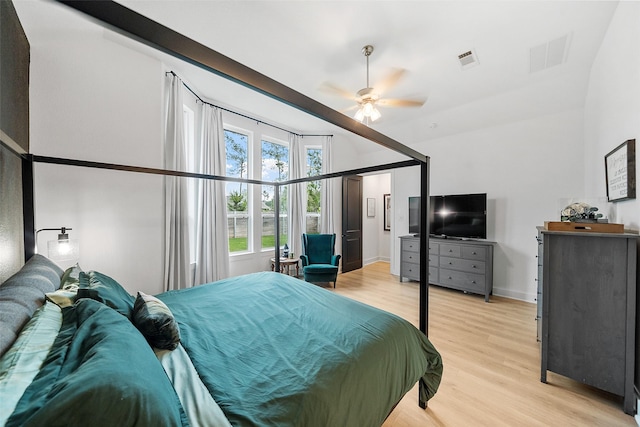 15040 Berry Brook Dr, Conroe, TX 77302 - bedroom featuring light wood-style floors, ceiling fan, and baseboards