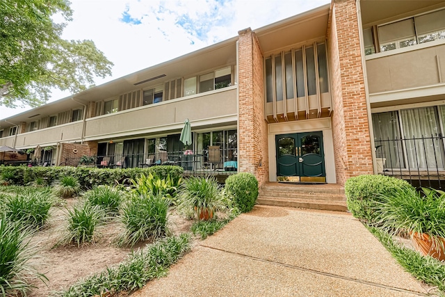 642 S Ripple Creek Dr Unit 642, Houston, TX 77057 - view of property with entry steps