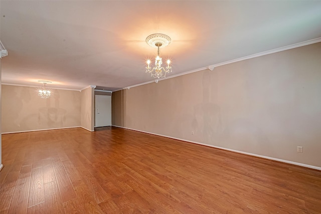 642 S Ripple Creek Dr Unit 642, Houston, TX 77057 - unfurnished room with a chandelier, crown molding, wood finished floors, and baseboards