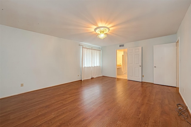 642 S Ripple Creek Dr Unit 642, Houston, TX 77057 - unfurnished bedroom featuring wood finished floors and baseboards