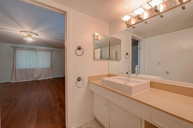 642 S Ripple Creek Dr Unit 642, Houston, TX 77057 - bathroom featuring wood finished floors and vanity