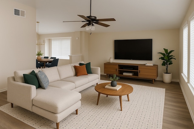 19710 Auburn Park Ln, Spring, TX 77379 - living room with wood finished floors, a ceiling fan, and baseboards