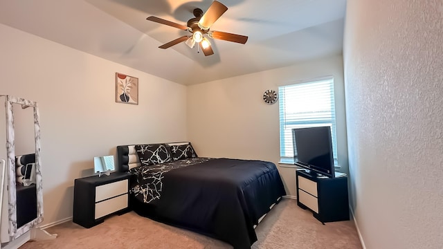 22614 Rosy Heights Trl, Tomball, TX 77377 - bedroom featuring light carpet, a textured wall, and a ceiling fan