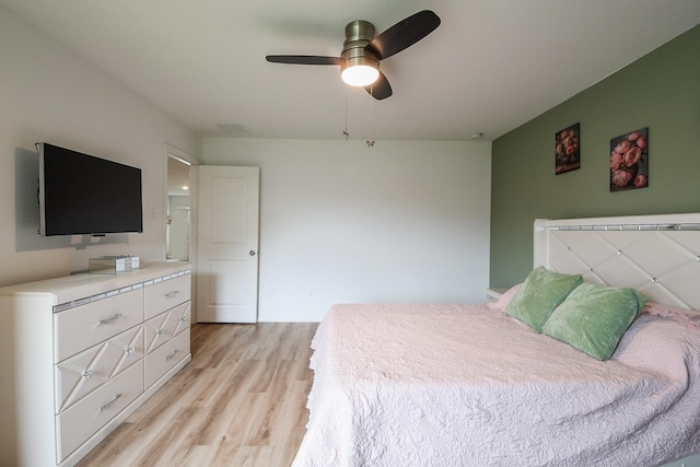 2728 Cadiz Bay Dr, Conroe, TX 77301 - bedroom featuring light wood-type flooring and a ceiling fan