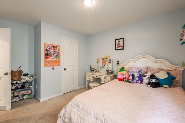 2728 Cadiz Bay Dr, Conroe, TX 77301 - bedroom with light carpet and baseboards