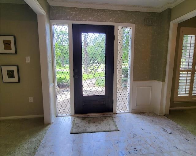456 Lexington Ct, Conroe, TX 77302 - entryway with a wainscoted wall, wallpapered walls, and crown molding