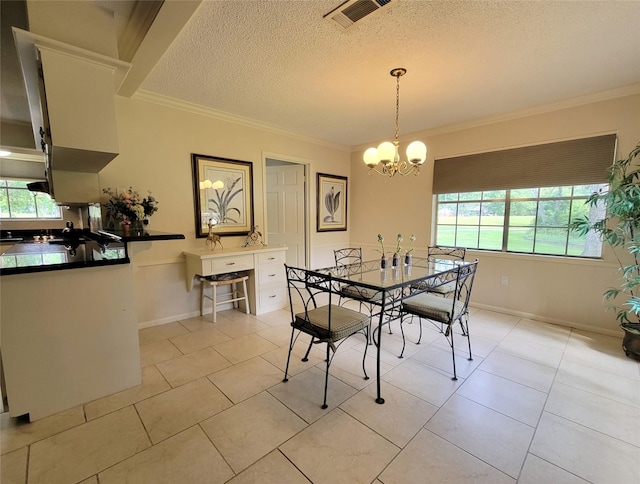 456 Lexington Ct, Conroe, TX 77302 - dining room featuring a chandelier, crown molding, a textured ceiling, light tile patterned floors, and baseboards