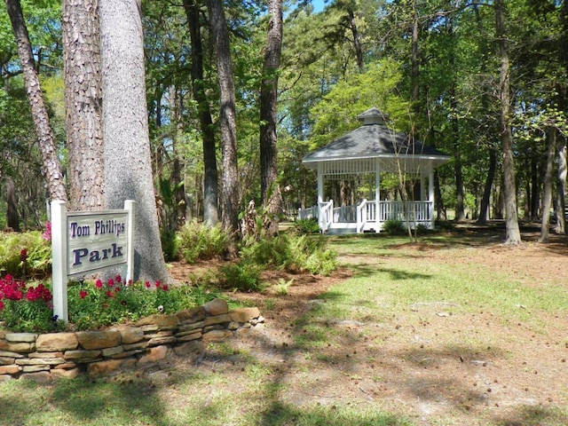 456 Lexington Ct, Conroe, TX 77302 - view of yard featuring a gazebo and a view of trees