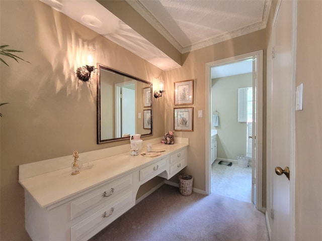 456 Lexington Ct, Conroe, TX 77302 - bathroom featuring vanity, ornamental molding, and baseboards