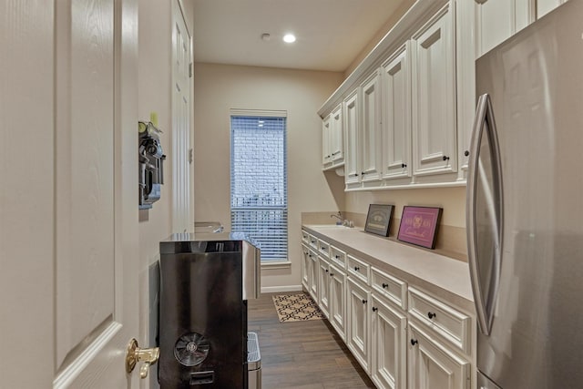 11872 Seashell Cir, Montgomery, TX 77356 - kitchen featuring freestanding refrigerator, light countertops, a sink, dark wood-type flooring, and recessed lighting