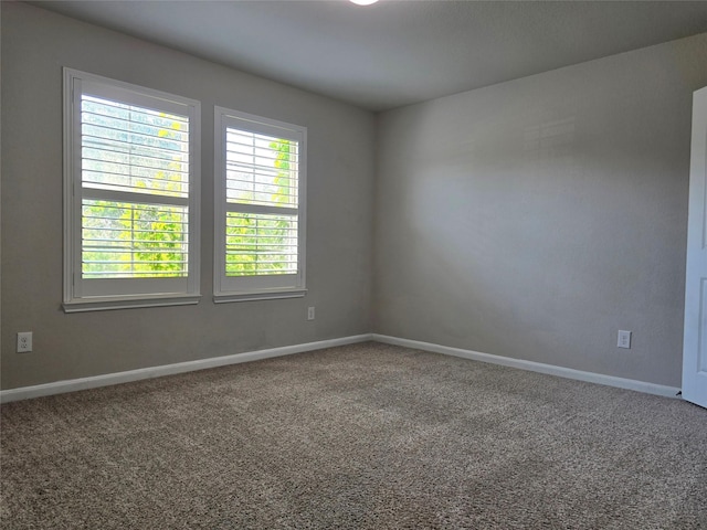 18411 Pelham Hollow Trl, Richmond, TX 77407 - empty room featuring carpet and baseboards