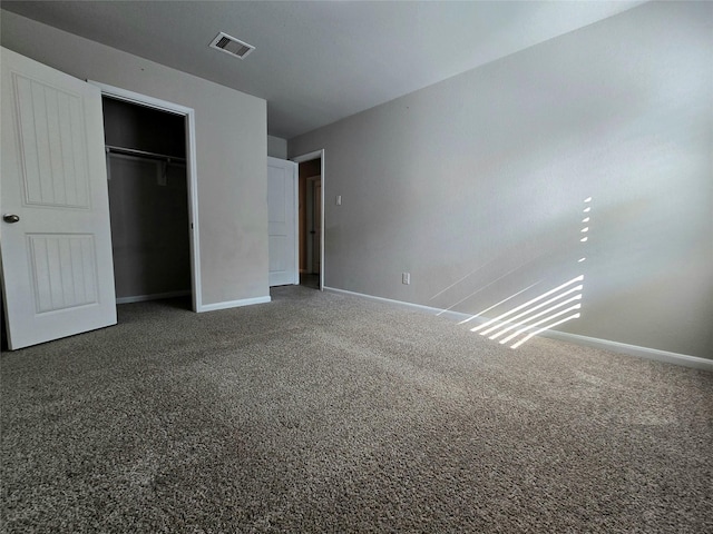 18411 Pelham Hollow Trl, Richmond, TX 77407 - unfurnished bedroom featuring carpet floors, baseboards, and a closet