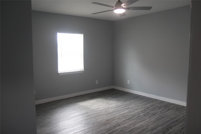 1115 W 4th St, Freeport, TX 77541 - unfurnished room featuring a ceiling fan and dark wood finished floors