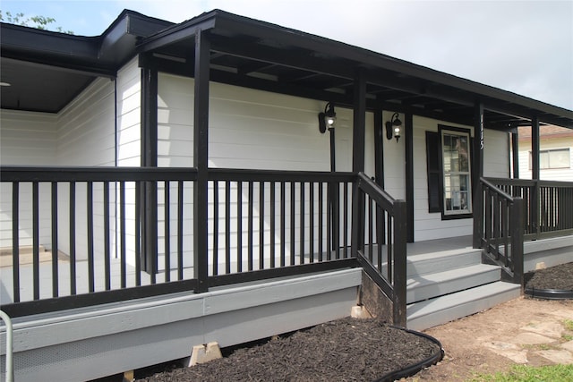 property entrance with a porch