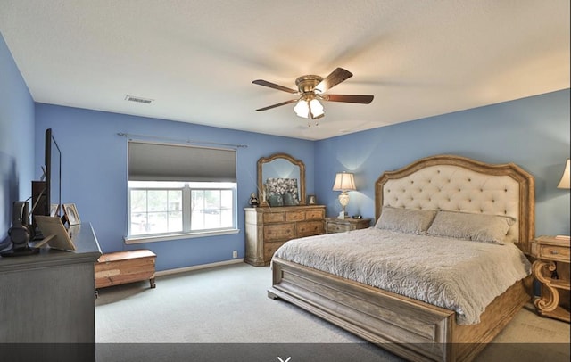 bedroom with carpet flooring, baseboards, and ceiling fan