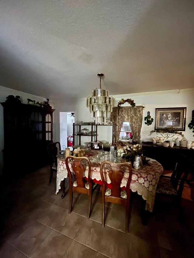 2923 Ellington St, Houston, TX 77088 - dining area with a chandelier, tile patterned floors, and a textured ceiling