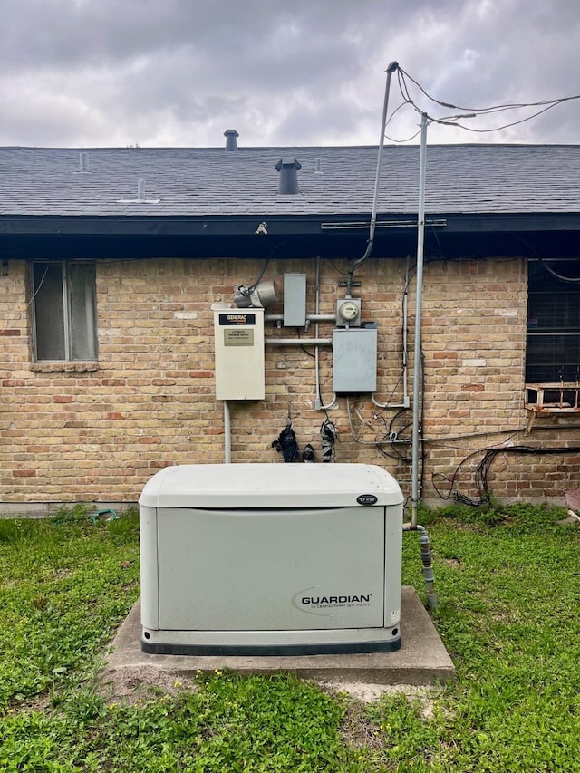 2923 Ellington St, Houston, TX 77088 - exterior view of a power unit, a shingled roof, and brick siding