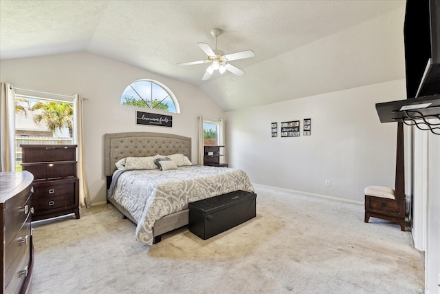 3413 Somerset Ln, Deer Park, TX 77536 - carpeted bedroom with vaulted ceiling, multiple windows, ceiling fan, and baseboards