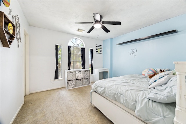 3413 Somerset Ln, Deer Park, TX 77536 - carpeted bedroom with baseboards and ceiling fan