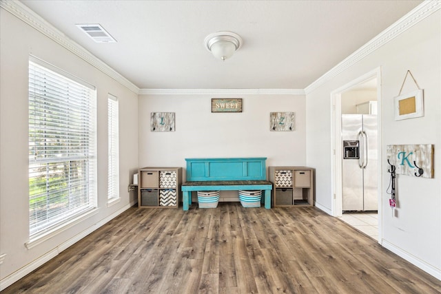 3413 Somerset Ln, Deer Park, TX 77536 - sitting room featuring plenty of natural light, crown molding, wood finished floors, and baseboards