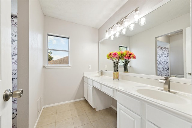 3413 Somerset Ln, Deer Park, TX 77536 - full bathroom featuring healthy amount of natural light, tile patterned floors, baseboards, and double vanity