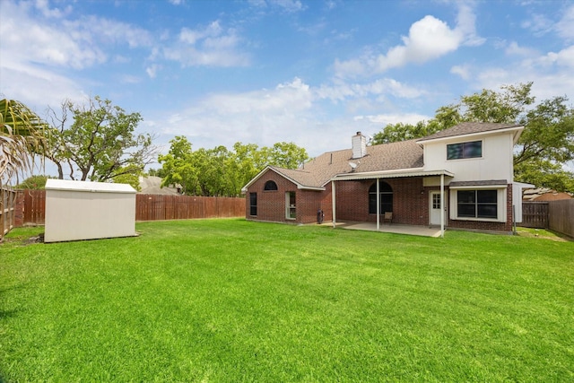 3413 Somerset Ln, Deer Park, TX 77536 - view of yard with a patio, an outbuilding, and a shed
