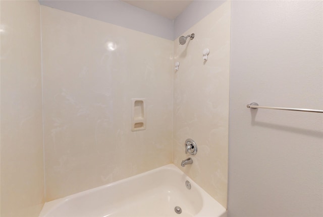 bathroom featuring  shower combination