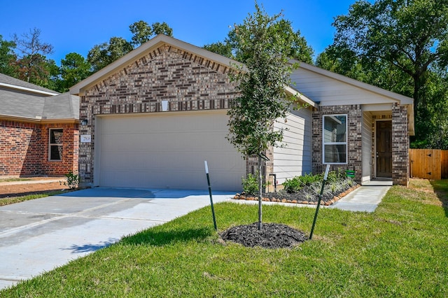 27638 Mesabe Dr, Magnolia, TX 77354 - view of front of home featuring a garage, concrete driveway, brick siding, and stone siding