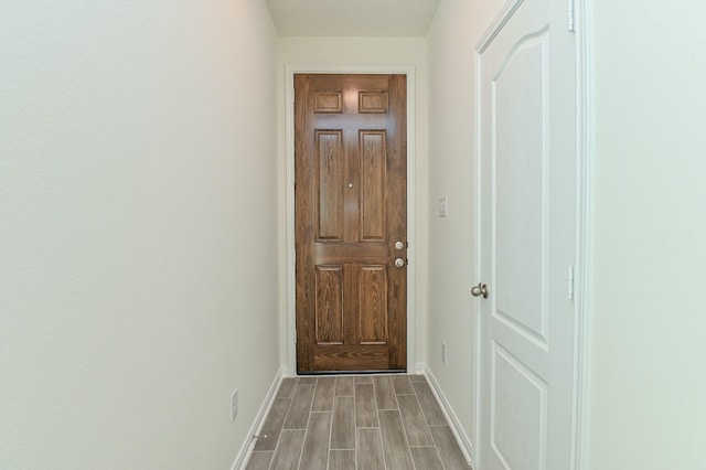 27638 Mesabe Dr, Magnolia, TX 77354 - entryway with baseboards and wood tiled floors