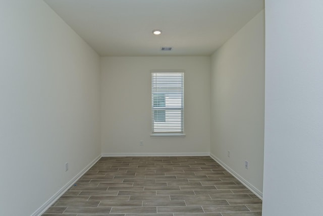27638 Mesabe Dr, Magnolia, TX 77354 - empty room with wood finished floors, baseboards, and recessed lighting