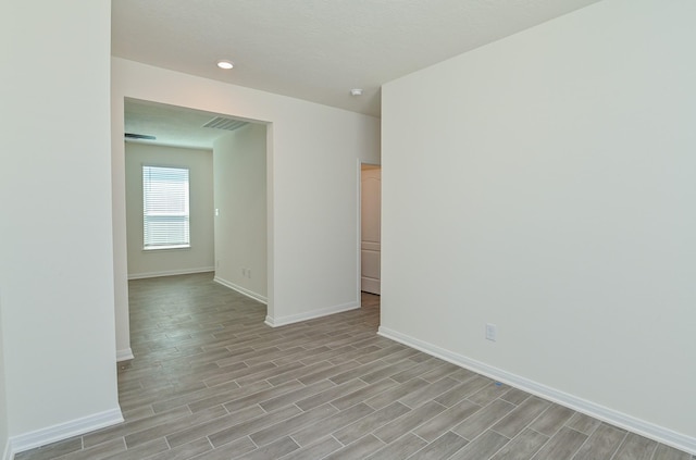 27638 Mesabe Dr, Magnolia, TX 77354 - empty room with baseboards and light wood-style floors