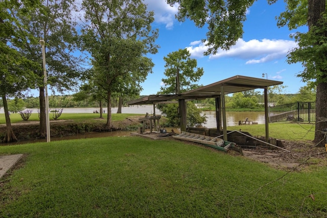 134 Magnolia Point Dr, Houston, TX 77336 - view of yard featuring a water view