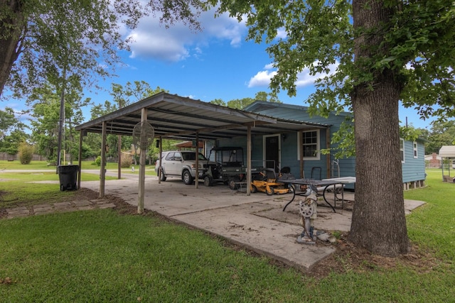 134 Magnolia Point Dr, Houston, TX 77336 - view of car parking with a carport and driveway