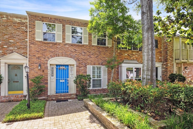 6407 Burgoyne Rd Unit 5, Houston, TX 77057 - view of property featuring brick siding