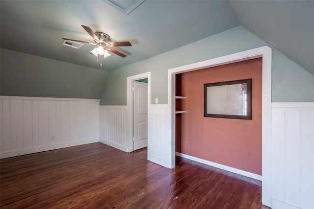 1109 Dismuke St, Houston, TX 77023 - bonus room with wainscoting, lofted ceiling, dark wood-type flooring, and ceiling fan