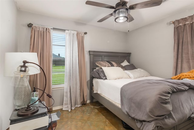79 E Pine Dr, Huffman, TX 77336 - bedroom with multiple windows, baseboards, and ceiling fan