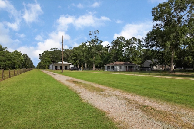 79 E Pine Dr, Huffman, TX 77336 - view of home's community featuring driveway and view of scattered trees