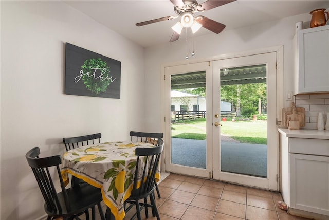 79 E Pine Dr, Huffman, TX 77336 - dining room with french doors, light tile patterned floors, and ceiling fan
