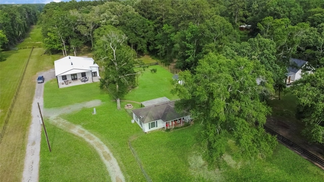 79 E Pine Dr, Huffman, TX 77336 - view of subject property featuring a heavily wooded area