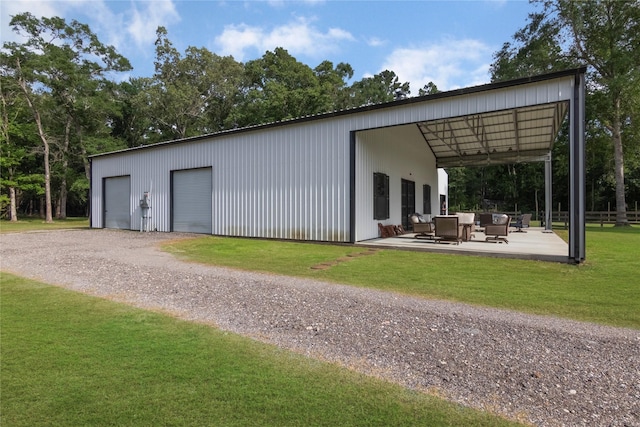 79 E Pine Dr, Huffman, TX 77336 - view of outdoor structure with an outdoor hangout area, an outdoor structure, and gravel driveway