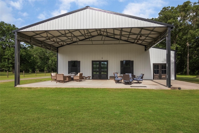 79 E Pine Dr, Huffman, TX 77336 - rear view of house with french doors, a yard, and a patio area