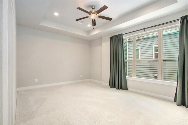 2422 Maufferd, Houston, TX 77009 - empty room featuring a tray ceiling, carpet, recessed lighting, and ceiling fan