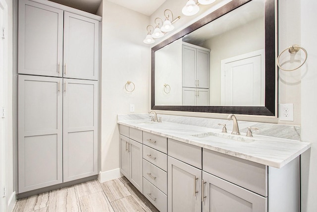 2422 Maufferd, Houston, TX 77009 - bathroom with double vanity and baseboards