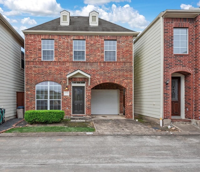 1774 Aden Dr, Houston, TX 77003 - view of front of home with brick siding, a garage, and driveway