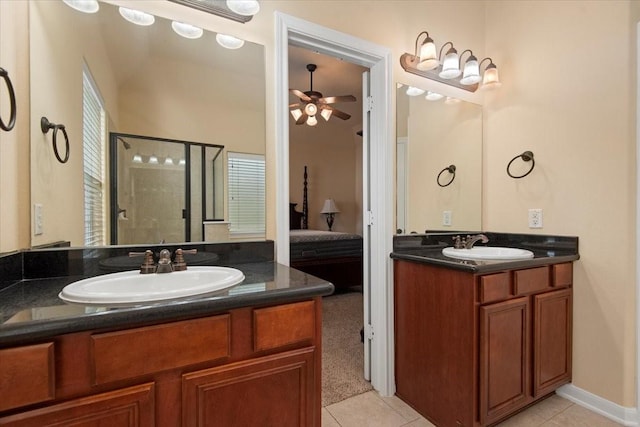 1774 Aden Dr, Houston, TX 77003 - bathroom with a ceiling fan, ensuite bath, a stall shower, and tile patterned floors