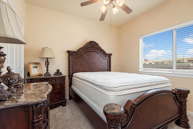1774 Aden Dr, Houston, TX 77003 - bedroom featuring light carpet, baseboards, and ceiling fan