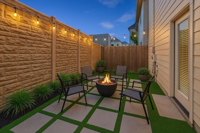 1774 Aden Dr, Houston, TX 77003 - view of patio with a fire pit and a fenced backyard
