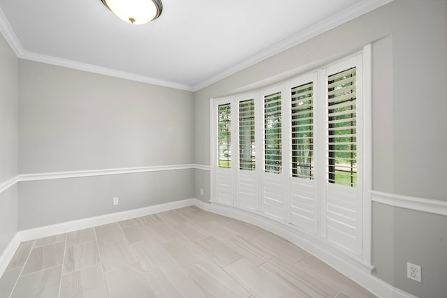 10139 Knoboak Dr, Houston, TX 77080 - spare room with crown molding and baseboards